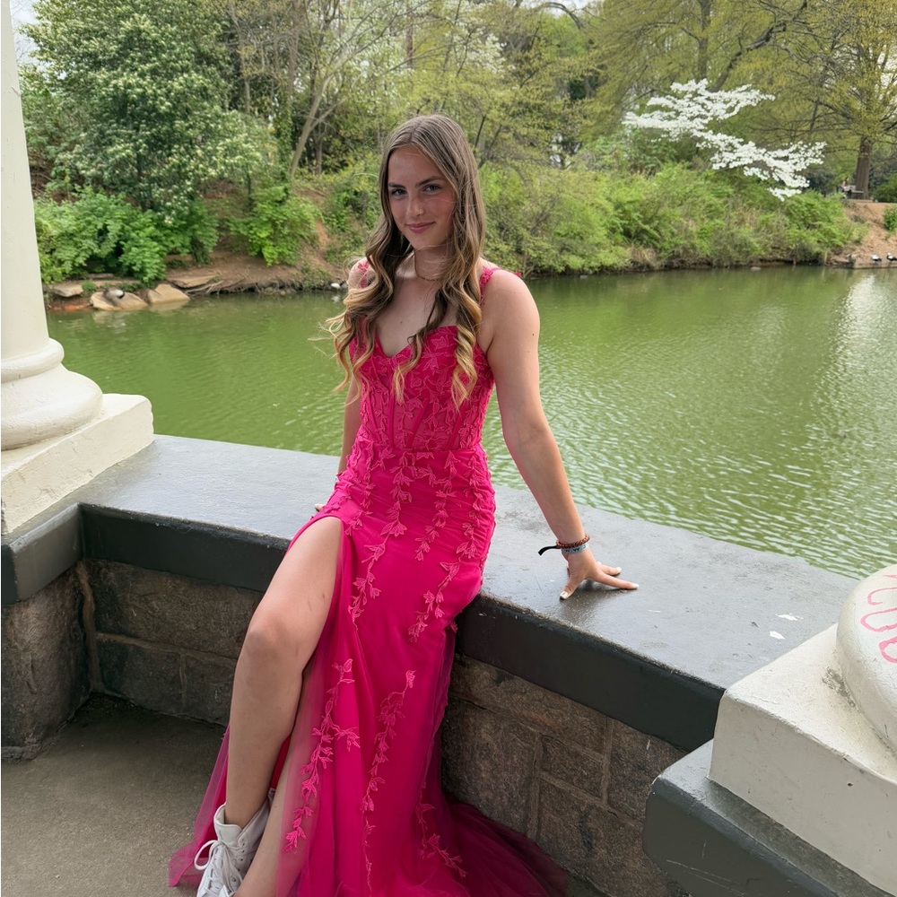 Elegant Pink Gown with Floral Details